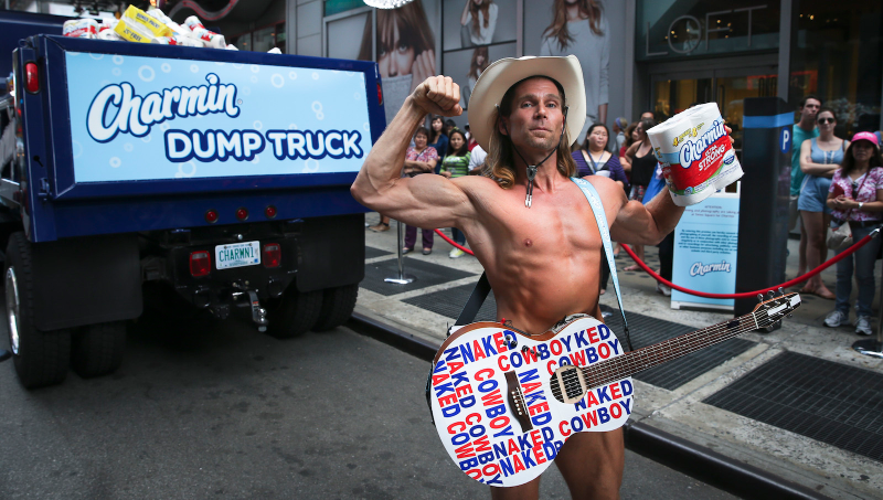 Here is the Naked Cowboy in happier times (2014) hawking toilet paper in Times Square.